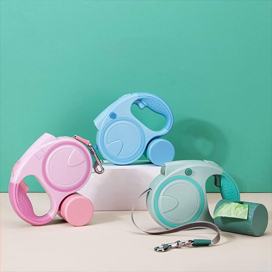 Laisse pour chien rétractable à poignée douce anti-fatigue de couleurs rose bleu et verte