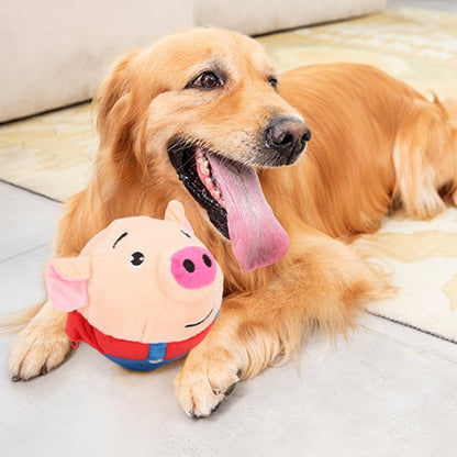 Golden fatigué et coucher avec son jouet pour chien cochon musicale